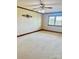 Spacious bedroom with plush carpeting, ceiling fan and natural light from the window at 212 Countryside Rd, Kings Mountain, NC 28086