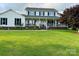 Charming two-story home featuring a welcoming front porch and a large, beautifully maintained lawn at 212 Countryside Rd, Kings Mountain, NC 28086