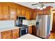 Fully equipped kitchen with stainless steel appliances, gas range, and wood cabinetry at 212 Countryside Rd, Kings Mountain, NC 28086