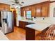 Kitchen featuring stainless steel appliances, light countertops, and wood cabinets at 212 Countryside Rd, Kings Mountain, NC 28086
