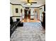 Comfortable living room with fireplace, hardwood floors, and backyard access at 212 Countryside Rd, Kings Mountain, NC 28086