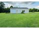 Outbuilding with a garage door, separate entrance and ample yard space at 212 Countryside Rd, Kings Mountain, NC 28086