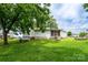 The backyard features a large, grassy area at 357 N Main St, Mount Pleasant, NC 28124