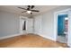 Bedroom featuring refinished floors, a ceiling fan and doorways at 357 N Main St, Mount Pleasant, NC 28124