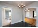 This dining room flows into the living room and the kitchen at 357 N Main St, Mount Pleasant, NC 28124