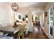 Open dining area with stylish furniture, natural light, and a view of the living room at 369 Skyland Ct, Mount Gilead, NC 27306
