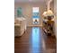 Cozy living room with hardwood floors, natural light, neutral decor, and scenic views at 369 Skyland Ct, Mount Gilead, NC 27306