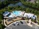 An aerial view reveals a community pool and clubhouse, offering a refreshing oasis for residents at 398 Hampton Trail Dr # 97, Fort Mill, SC 29708