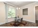 Cozy dining area featuring lots of natural light and an attractive chandelier at 398 Hampton Trail Dr # 97, Fort Mill, SC 29708