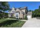 Charming home with a two-car garage, brick and siding exterior, and a well-maintained lawn at 398 Hampton Trail Dr # 97, Fort Mill, SC 29708