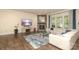 Bright and airy living room featuring a beautiful fireplace, TV, and comfortable seating at 398 Hampton Trail Dr # 97, Fort Mill, SC 29708