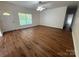 Inviting living room with wood-look floors, a bright window, and a welcoming atmosphere at 40287 Palmerville Rd, New London, NC 28127