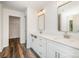 Bright bathroom featuring a double vanity with quartz countertops and modern rectangular undermount sinks at 4037 Jenison Valley Ct, Charlotte, NC 28214