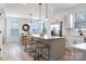 Eat-in kitchen with island featuring white cabinets and stainless steel appliances at 4038 Jenison Valley Ct, Charlotte, NC 28214