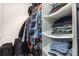 This closet is equipped with shelves and a clothing rod holding numerous items at 409 Lexie Ln, Rock Hill, SC 29732
