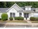 Charming home with white siding, well-manicured landscaping, and a welcoming entrance at 409 Lexie Ln, Rock Hill, SC 29732