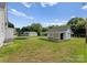 Large green backyard with a -shed and recreational equipment at 515 N Main Gq St, Granite Quarry, NC 28146