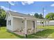 Charming shed featuring a covered porch area with seating and a ' Shed' sign at 515 N Main Gq St, Granite Quarry, NC 28146