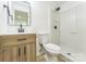 Bathroom featuring wood vanity and walk-in shower at 5226 Fair Wind Ln, Charlotte, NC 28212
