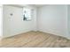 Spacious living room with light-toned hardwood floors at 5226 Fair Wind Ln, Charlotte, NC 28212