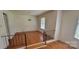 Inviting dining room area with hardwood flooring and a classic chandelier at 7017 Knightswood Dr, Charlotte, NC 28226