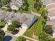 Aerial view of the property showcasing the home, landscaping, and surrounding neighborhood at 8036 Crater Lake Dr, Fort Mill, SC 29707
