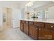Bathroom featuring double sinks, spacious vanity, and walk in closet at 8036 Crater Lake Dr, Fort Mill, SC 29707