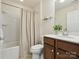 Bathroom with a single sink vanity and shower and bath tub combination at 8036 Crater Lake Dr, Fort Mill, SC 29707