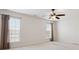 Bright bedroom with two large windows and ceiling fan at 8036 Crater Lake Dr, Fort Mill, SC 29707