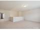 Spacious bonus room with neutral carpet and plenty of natural light at 8036 Crater Lake Dr, Fort Mill, SC 29707