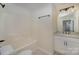 Bathroom featuring white vanity, granite countertop, and shower/tub combo at 903 Brookdale St, Kannapolis, NC 28083