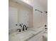 Bathroom with granite countertop, white cabinet, and modern fixtures at 903 Brookdale St, Kannapolis, NC 28083