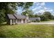View of two well-maintained homes with green lawns and mature trees; a peaceful, inviting community at 903 Brookdale St, Kannapolis, NC 28083