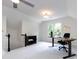 Bright bonus room featuring a desk, black chair, and large window with natural light at 9415 Braemar Ter, Charlotte, NC 28210