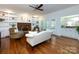 Inviting living room boasts fireplace, built-ins, hardwood flooring and access to the outdoor patio at 9415 Braemar Ter, Charlotte, NC 28210