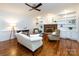 Bright living room with hardwood floors, fireplace, and built-in bookshelves at 9415 Braemar Ter, Charlotte, NC 28210