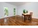 Room featuring hardwood floors, natural light, and a classic desk at 9415 Braemar Ter, Charlotte, NC 28210