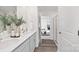 Bathroom featuring double sinks, white countertops, a shower, and neutral walls at 1043 20Th Avenue Se Loop, Hickory, NC 28602