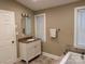 Bathroom with granite vanity and soaking tub at 110 Indian Harbor Cir, Mount Gilead, NC 27306