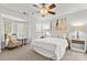 Bright bedroom with natural light, ceiling fan, and neutral decor at 1125 Kurt Ct, Charlotte, NC 28209