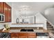 Kitchen featuring granite countertops, stainless steel appliances, and an open view to the living area at 1125 Kurt Ct, Charlotte, NC 28209