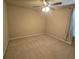 Neutral bedroom with carpet, a ceiling fan, and a large window with natural lighting at 11538 Ardrey Crest Dr, Charlotte, NC 28277