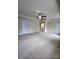 Spacious bedroom features plush carpeting, a ceiling fan, and neutral walls, creates a serene atmosphere at 11538 Ardrey Crest Dr, Charlotte, NC 28277
