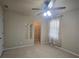 Inviting bedroom with a walk-in closet, a window, and a ceiling fan for added comfort and convenience at 11538 Ardrey Crest Dr, Charlotte, NC 28277