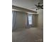Bright bedroom with large windows, a ceiling fan and neutral carpet flooring at 11538 Ardrey Crest Dr, Charlotte, NC 28277