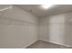 Walk-in closet with wire shelving and carpet flooring at 11538 Ardrey Crest Dr, Charlotte, NC 28277