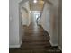 Inviting entryway with hardwood floors and a view of the staircase; elegant and spacious at 11538 Ardrey Crest Dr, Charlotte, NC 28277