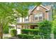 Beautiful home with stone accents, a covered porch, and lush greenery at 11538 Ardrey Crest Dr, Charlotte, NC 28277