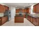 Open kitchen with granite countertops, stainless steel appliances, and a central kitchen island at 11538 Ardrey Crest Dr, Charlotte, NC 28277