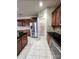 Spacious kitchen with stainless steel appliances, dark cabinets, and a walk-in pantry at 11538 Ardrey Crest Dr, Charlotte, NC 28277